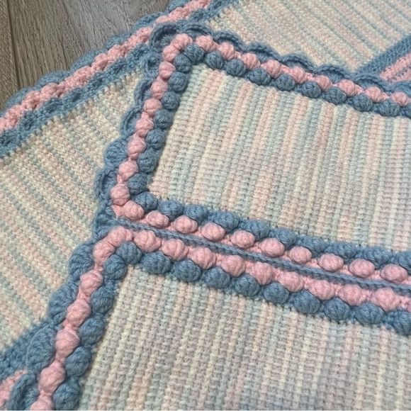 Hand Knitted Baby Blanket Blue and pink scalloped hem and pom pom edges. - Picture 6 of 6